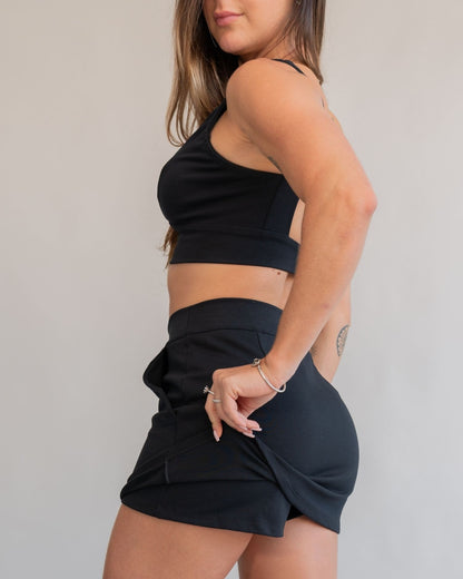 Short saia preto feminino lateral caimento ponto roma